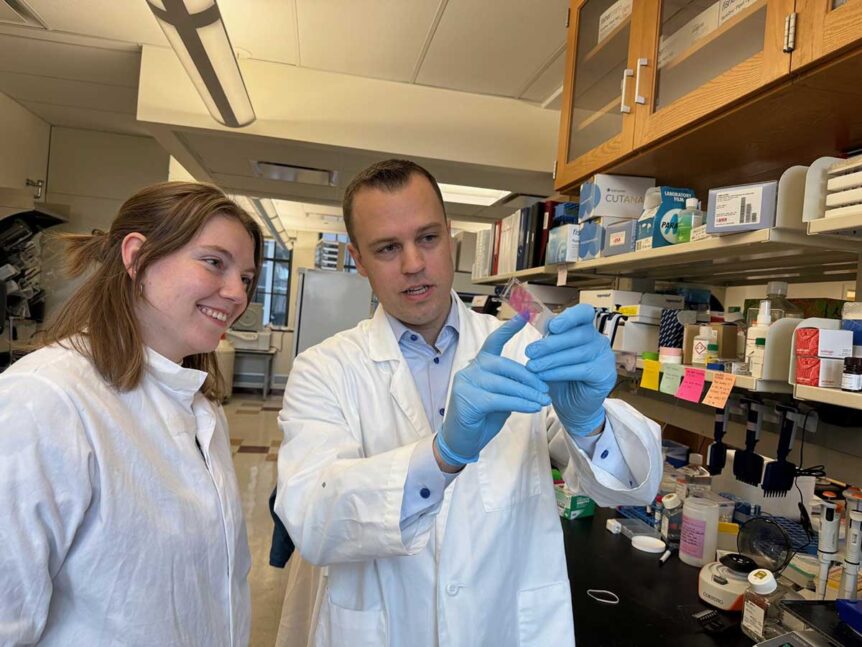 David Gate, researcher at the Les Turner ALS Center at Northwestern Medicine, at work in his lab